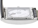 an image of a close up of a watch on a white surface