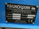 a picture of a sign on the side of a blue machine
