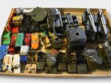 a box full of toy cars and other toy vehicles