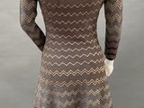 the back of a mannequin dress with a chevron pattern