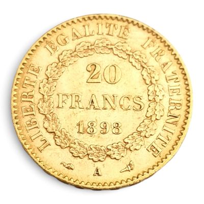une vieille pièce française de 20 francs sur fond blanc