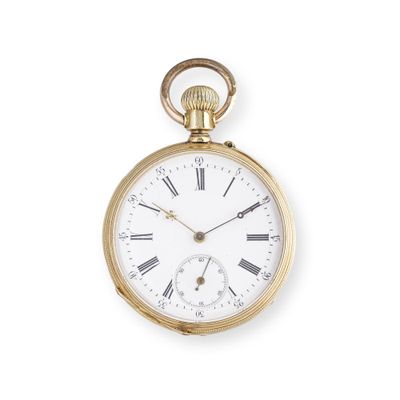 a gold pocket watch with roman numerals on the face