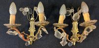 Paire d'appliques à deux bras de lumière en laiton à décor d…