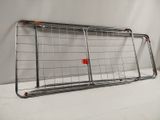 a metal rack that has a red button on it