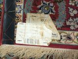 a piece of paper that has been placed on a rug