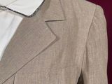 a mannequin wearing a suit and tie on a mannequin mannequin
