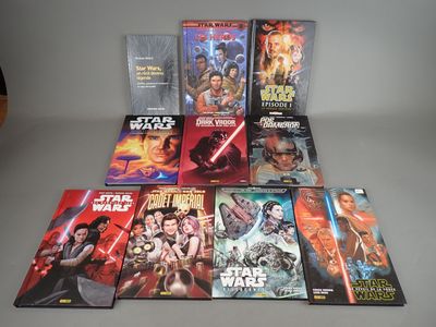 a lot of star wars books on the table