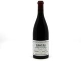 a bottle of wine that is sitting on a table
