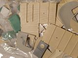 many pieces of cardboard that are laying on a table