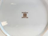 a close up of a plate with a picture on it