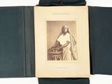 a book opened to show a picture of a nun