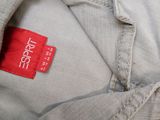a close up of a red tag on the back of a pair of jeans