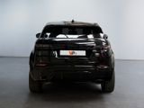 a picture of a black car parked in a showroom