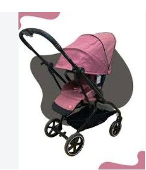 pink baby stroller with black handlebars and black wheels
