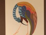 a picture of a bird that is painted on the wall