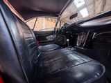 a black leather seat in the back of a car