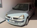 a picture of a silver car parked in a garage