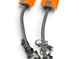 a pair of orange cables connected to each other on a white surface