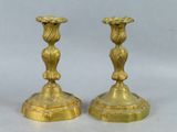 pair of antique brass candlesticks on marble bases