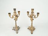 pair of antique brass candelabs with black candlesticks