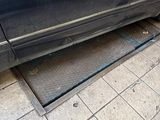 a car that is parked on the side of the street