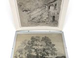an open book with a drawing of a house and a tree
