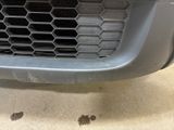 a close up of the front bumper of a car