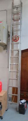 a picture of a room with a ladder in it