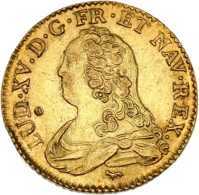 une pièce d'or sur laquelle est représenté le profil d'une femme