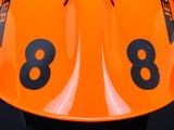 an orange helmet with the number 8 on it