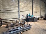 a large warehouse with a lot of metal items in it