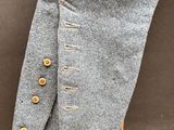 a close up of a pair of pants with buttons on them
