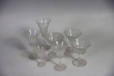 a group of wine glasses sitting on a table