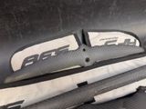 the back of a pair of skis sitting on top of a table