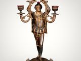 an image of a statue of a woman holding a candelabra