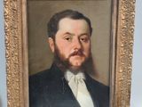 tableau représentant un homme barbu en costume et nœud papillon