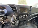 a car dashboard with a digital display and a steering wheel