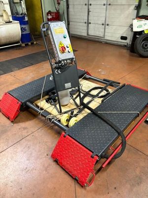 l'image d'une machine installée dans un garage