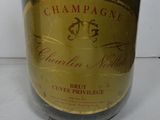 a bottle of champagne sitting on a table