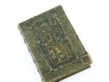 an old book with a picture of a man on it