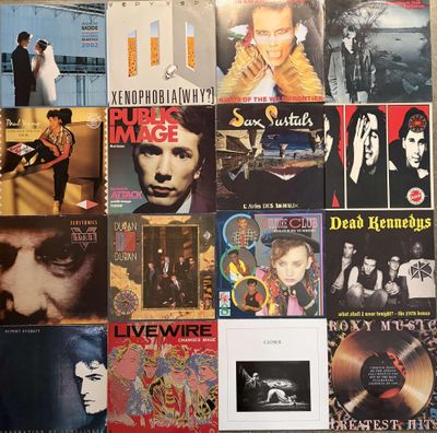 a lot of records on the wall of a room