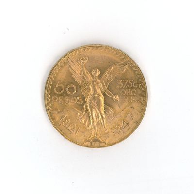 une image d'une pièce d'or sur une surface blanche