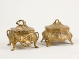 pair of gold plated sugar dishes with handles and handles