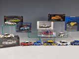 a lot of toy cars on display in a display case