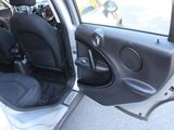a car door open with the driver ' s seat up