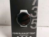 a close up of a box with a watch on it