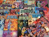 a lot of comic books that are on the table