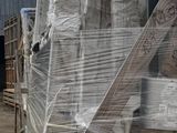 a picture of a building that has a bunch of bags on top of it
