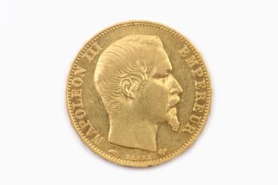 l'image d'une pièce d'or sur laquelle figure le visage d'un homme