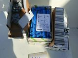 a box of legos and a piece of paper on a table